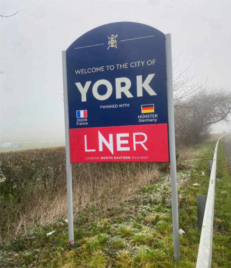 one of the news welcome to York signs