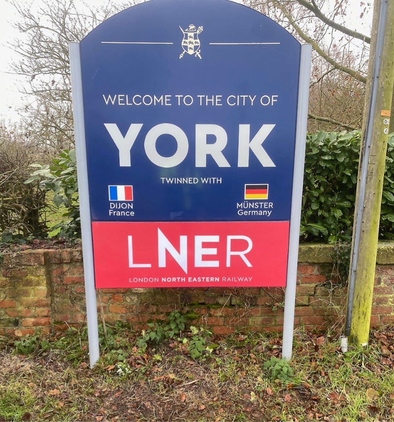 Welcome to york sign showing recent Twin additions.