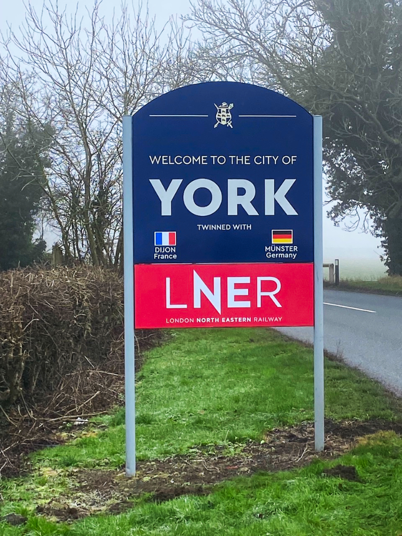 one of the news welcome to York signs